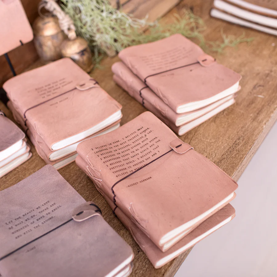 Stacks of leather notebooks